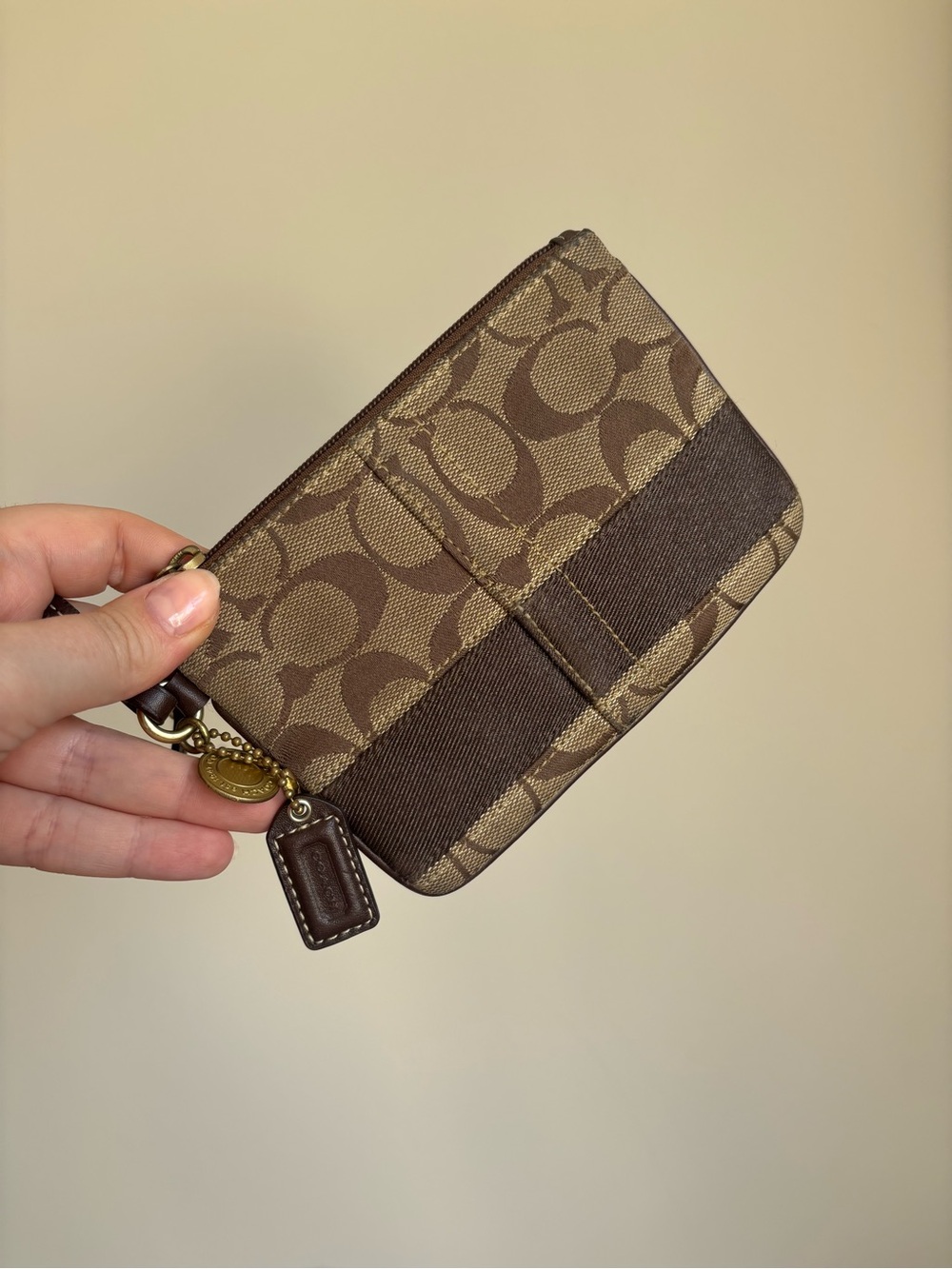 Coach legacy signature stripe wristlet brown with multicolour interior